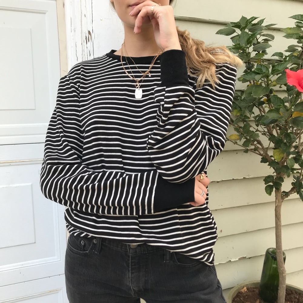 Reformation sweater top.